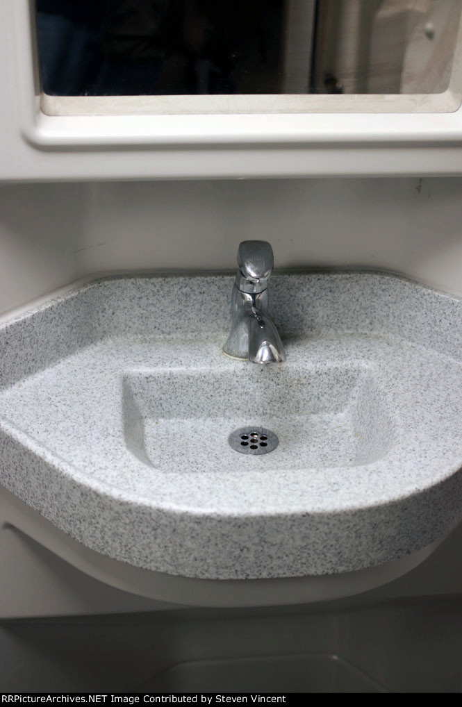 Genuine imitation marble sink in a Metrolink rehabbed coach SCAX #111